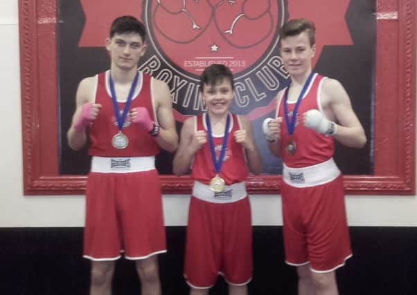 Galashiels Boxing Club's young fighters, from left,  Arix Ross, Lex Rogerson and Max Rogerson. Absent is Davids Lukjanovs.