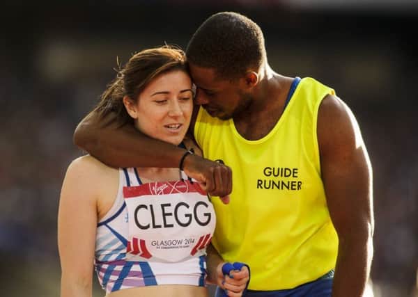 Libby Clegg with her guide runner. Chris Clarke  (picture by Bobby Gavin)