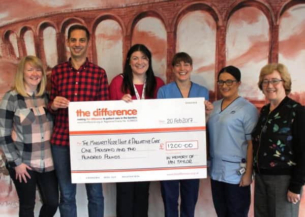 Angus Holmes, Sarah Holmes and Frankie Taylor are pictured above handing over Â£1,200 to the Margaret Kerr Unit and Palliative Care fund at NHS Borders.