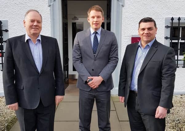 Barony Castle general manager Vytautas Syvys flanked by PHM directors
Richard Spanner, left, and Scott Weatherby.