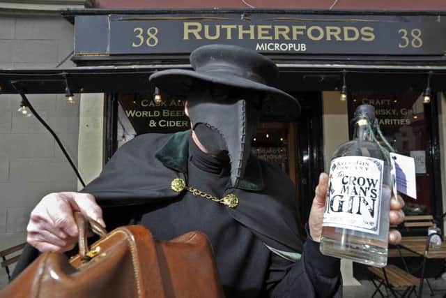 'The Crowman' (Andrew Crow) in Kelso with local made brew of Kelso Crowman's Gin.