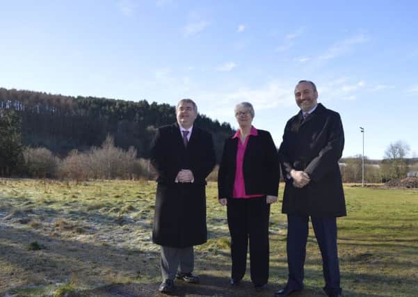 Scottish Borders Council leader David Parker, Mid Berwickshire councillor Frances Renton,the authority's executive member for social work and housing, and Nile Istephan, chief executive of Eildon Housing Association, at the former Earlston High School site.
