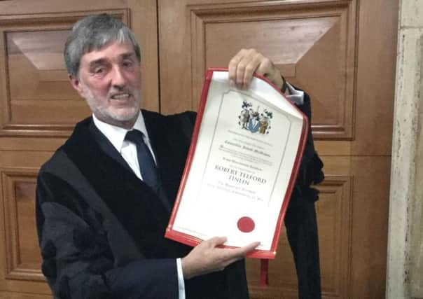 Rob Tinlin with his honour.