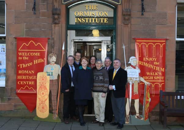 ictured at the museum are, front from left, councillors Iain Gillespie and Vicky Davidson, Trimontium Trust secretary Donald Gordon and council leader David Parker, with, back, trust chairman John Reid, museum curator Fiona Colton and councillor Jim Torrance.