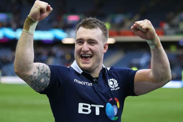 Stuart Hogg celebrating Scotland's RBS 6 Nations victory over Wales at Murrayfield.