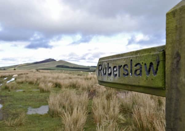 A sign pointing to Ruberslaw, near Hawick.