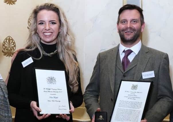 Katie Fairfull and Sinclair Paterson with their respective awards from the Worshipful Company of Weavers in London.