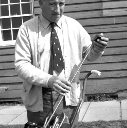 Former sprinter John Dawson from Jedburgh, with his golf clubs in July 1979.