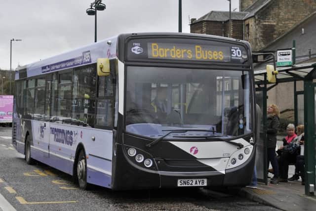 An X95 in Hawick bearing the Borders Buses name but not yet its livery.