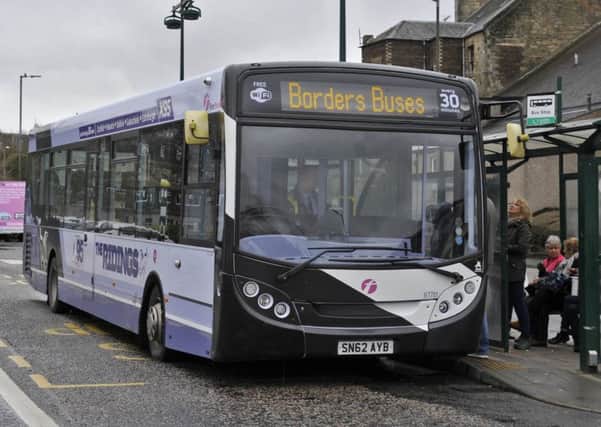An X95 in Hawick bearing the Borders Buses name but not yet its livery.