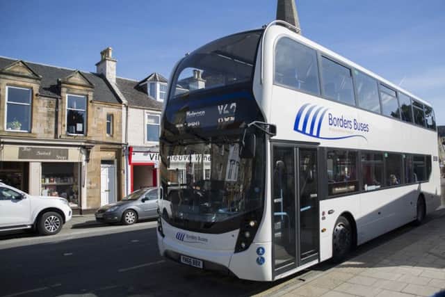 A bus in Peebles bearing the new Borders Buses livery.
