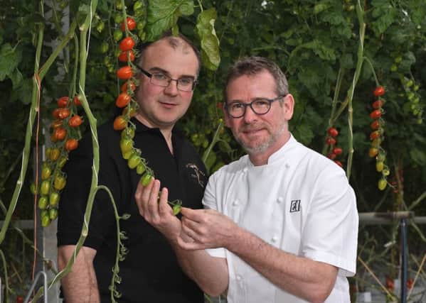 L-r, Jim Shanks of Standhill Farm with Chef Andrew Fairlie visiting Standhill Farm near Hawick this morning. Andrew was taken on a tour around the large greenhouse which grows tomatoes for Scotty Brand food products.