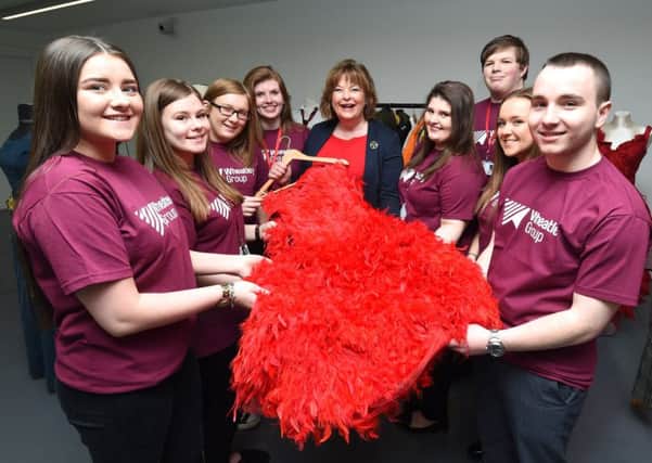 Wheatley Group Modern Apprentices meet Culture Secretary Fiona Hyslop at  the National Theatre of Scotland's new facility, Rockvilla to launch First Nights, a new partnership between the National Theatre of Scotland and Wheatley Foundation to give young people living in Wheatley homes their first opportunity to experience live theatre.