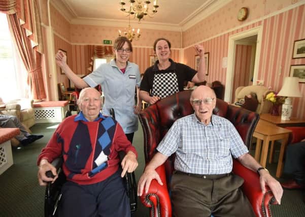 Bonchester Bridge Care Home staff, Julie Bandeen, left, and Michelle Scott with residents David Easton and Jimmy Taylor.
