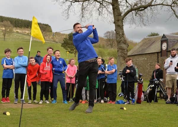 Alex Dunbar tees off on the new Galashiels course (picture by Alwyn Johnston)