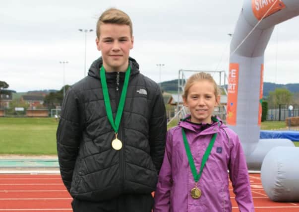 Gala Harriers Gregor Collins and Isla Paterson, who excelled in the 3k fun run.