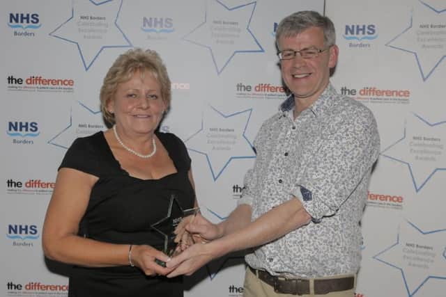 The behind the scenes, clinical award was received by June Patterson, theatre sister at NHS Borders, pictured here with Brian Magowan, an NHS Borders consultant.