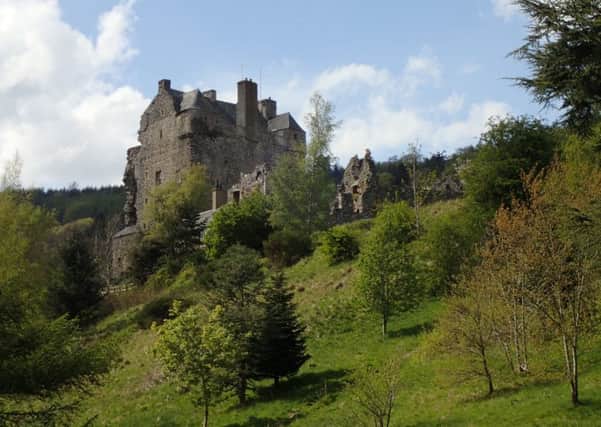 The path takes you past the wooded and rocky slopes below the dramatic Neidpath Castle.