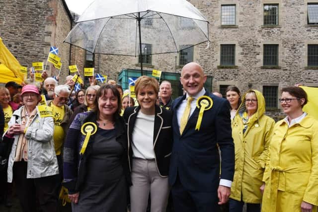 SNP candidates in the by-election and General election respectively, Gail Hendry and Calum Kerr, with First Minister Nicola Sturgeon and a host of party supporters in Hawick today.