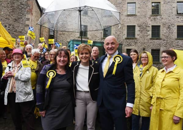 SNP candidates in the by-election and General election respectively, Gail Hendry and Calum Kerr, with First Minister Nicola Sturgeon and a host of party supporters in Hawick today.