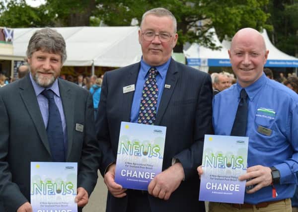 NFU Scotland's Presidential team launch the discussion document at the Highland Show. Left to right are Martin Kennedy, Andrew McCornick and Gary Mitchell.