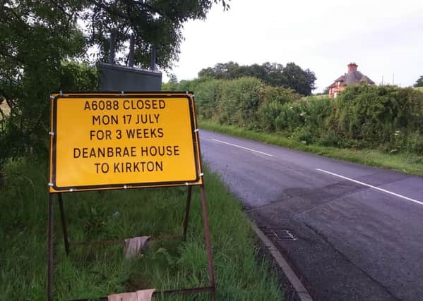 A sign warning of a road closure on the A6088 near Hawick.