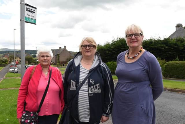 From left, bus users Kate Oliver and Sally Robertson with councillor Clair Ramage.