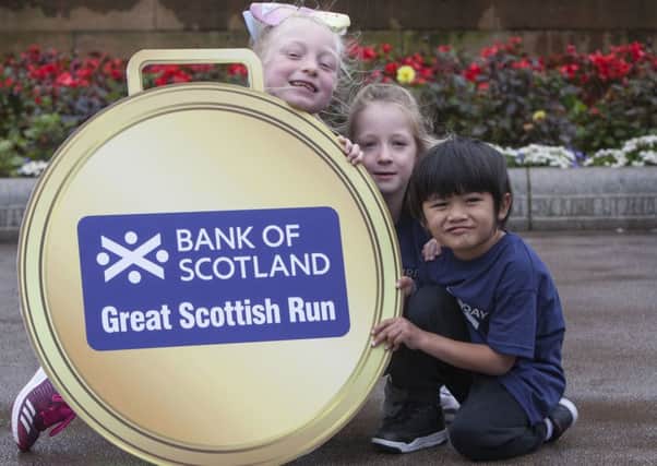 From left: Freya Brown, Anna Wardrop and Adam Khairi are encouraging other youngsters to sign up for the Great Scottish Run.
