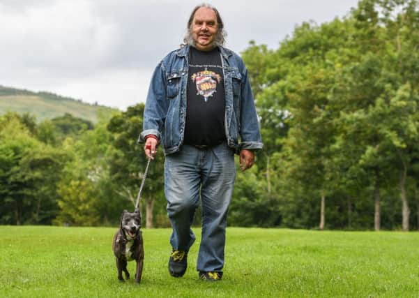 Gerald and dog Lulu have enjoyed the benefits of a healthy lifestyle. Picture: Phil Wilkinson