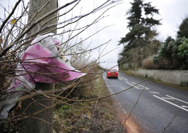 Flowers left as a tribute to Hawick's Leon Ali following his death on the A698 in November.
