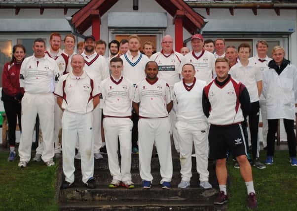 The squads who took part in the memorial cricket game.