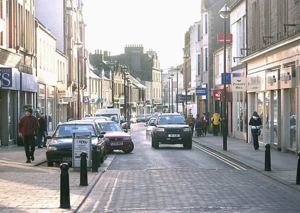 He denies struggling with a man in Galashiels town centre.