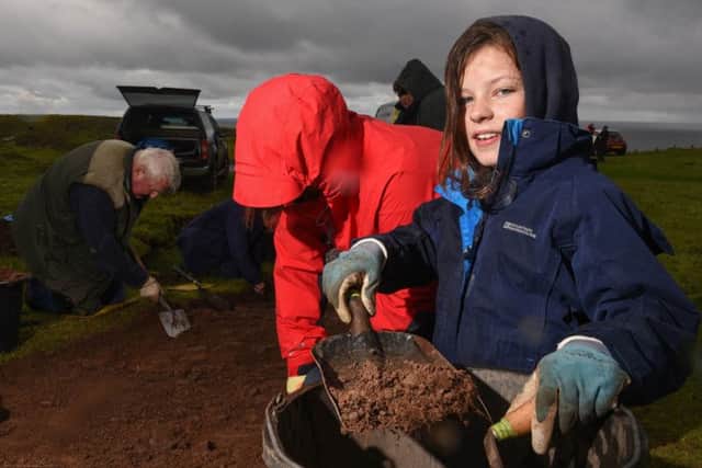 Archeological dig near St Abbs Lighthouse to try to uncover some dwellings probably once owed by the Lighthouse Board. Volunteer Carrie Gibson from St Abbs.