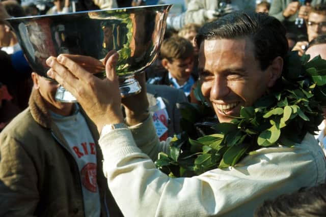 Jim Clark celebrating a victory in the US in 1966.