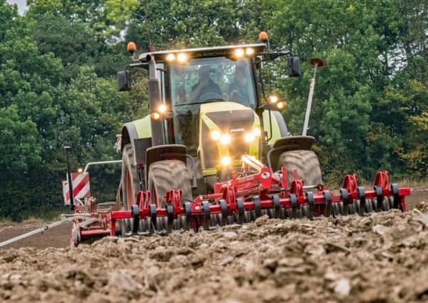 Difficult weather at the end of last month pushed farmers into extending the better working days  here is sowing taking place on a Sunday evening at Bewlie Farm, Lilliesleaf