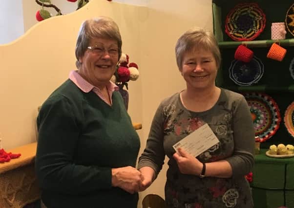The Souter Stormers have rased more than Â£3070 for Fresh Start Borders, Knit Aid and the Men's Shed through September's Fully Woolly project. Kay Ross, Souter Stormers convenor, presenting cheque for Â£1345.00 to Irene McFadzen (FRESH START BORDERS)