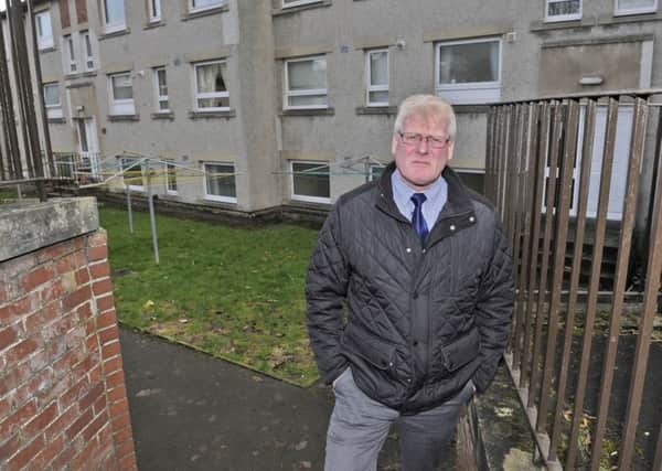 Hawick councillor Stuart Marshall in the Wellfield area of Hawick where there's a dog fouling problem.