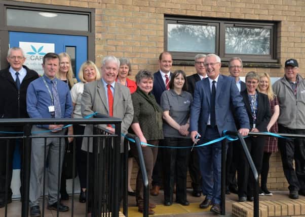 Jim Wilson, chairman of the SB Cares board, officially opening the new community equipment service premises at Tweedbank, accompanied by Kelso councillor Tom Weatherston, executive member for adult social care at Scottish Borders Council, and Selkirkshire councillor Elaine Thornton-Nicol.