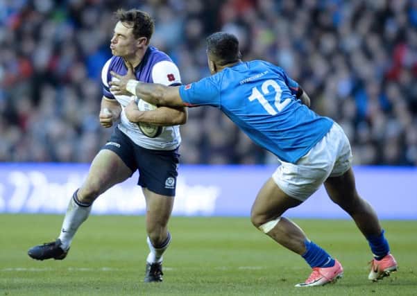 Lee Jones, from Selkirk, tries to evade Reynold Lee-Lo of Samoa during last week's Autumn international (picture by Neil Hanna Photography)