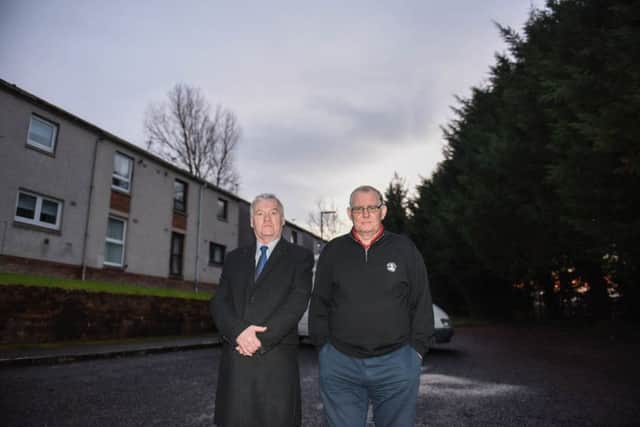 Hawick councillor Davie Paterson with Borthaugh Road resident Bruce Lindsay. Picture by Stuart Cobley.