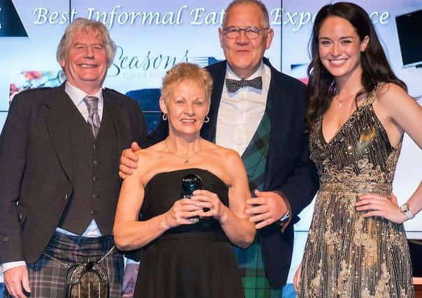 Presenter Marshall Bain, president of the Scottish Licensed Trade Association, with Roger and Bea McKie of Seasons and host Jennifer Reoch.
