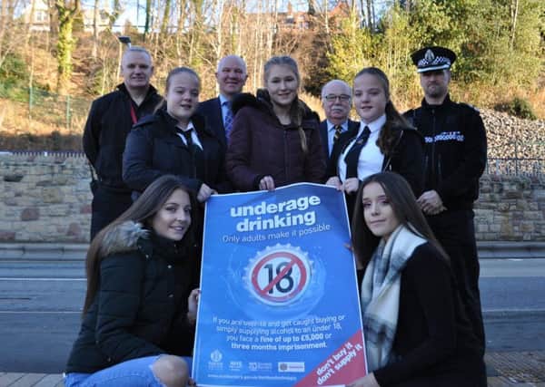 Back row from left: Andy Girrity from Scottish Fire and Rescue Service, Councillor Watson McAteer, Councillor John Greenwell and Inspector Tony Hodges. Middle row: TD1 Youth Hub members Siobhan, Tamsin and Lauren. Front row: Myrran and Amy.