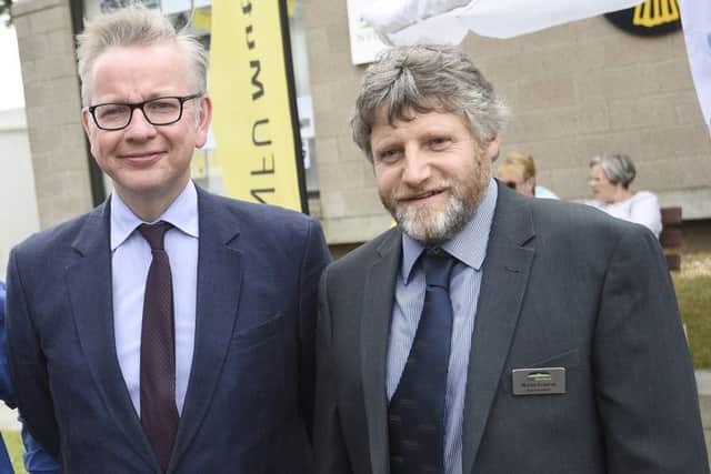 National Farmers' Union Scotland vice-president Martin Kennedy, right, with Michael Gove, the cabinet minister in line to have the final say on plans to bring back the Eurasian lynx.