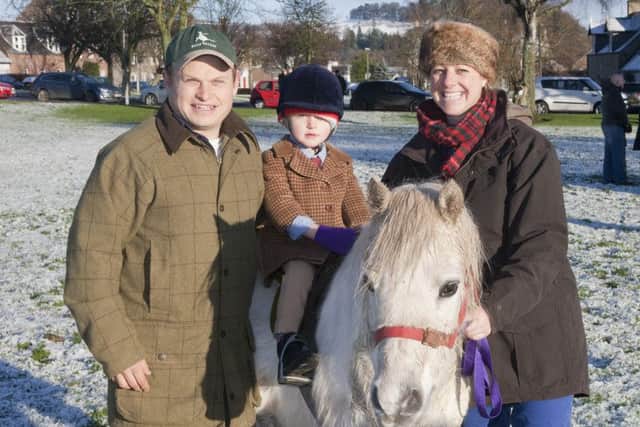 Harry, David and Katie Reddilough at Denholm for the Jed Forest Hunt's Boxing Day meet.