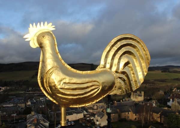 The gleaming golden cockerel, which sits atop Sir Walter Scott's Courthouse