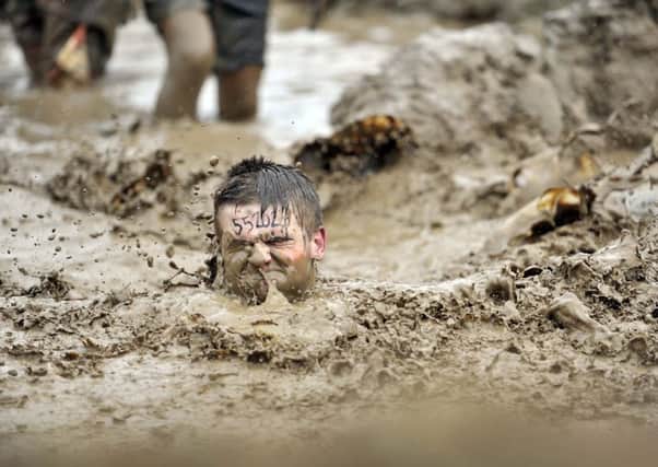 Stop being a stick in the mud...and get down and dirty in it when Tough Mudder returns to Drumlanrig Castle on June 16 and June 17 this year. (Pic: Robert Perry)
