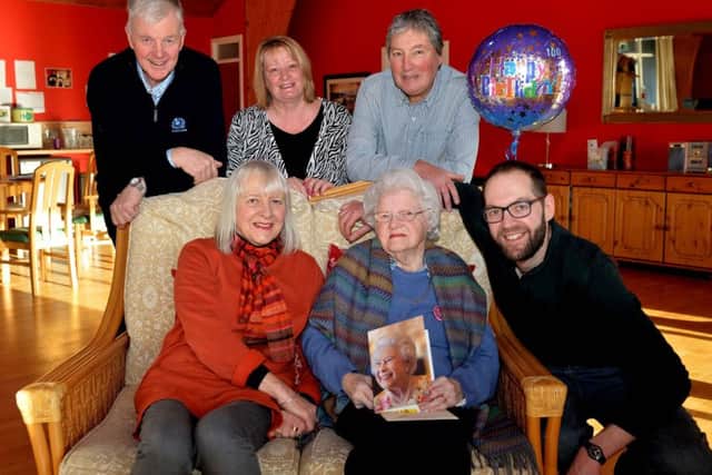 Betty Stafford, who was 100 on Monday, with her daughter Marlene Davies and grandson Gavin Davies. Rear row, Betty's second cousin Andrew Brown and his wife Fiona, with Marlene's husband Douglas Davies.