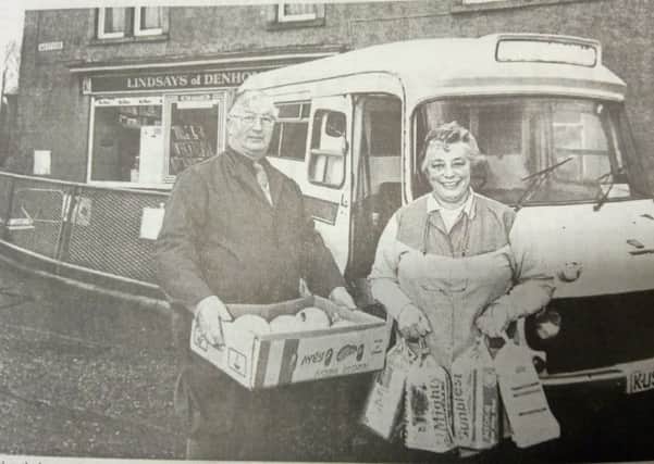 Brother and sister John and Margaret Lindsay load their  van for the final rural delivery in 1968.