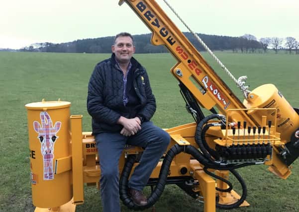 Doddie Weir with one of 175 lots being sold to raise funds for his charities, a Borders-made Bryce Suma post-driver.