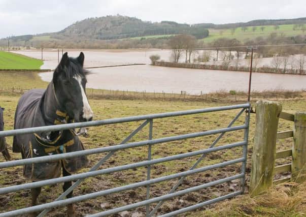 Fields flooded on the A698 near Born in the Borders at Lanton Mill, near Jedburgh.